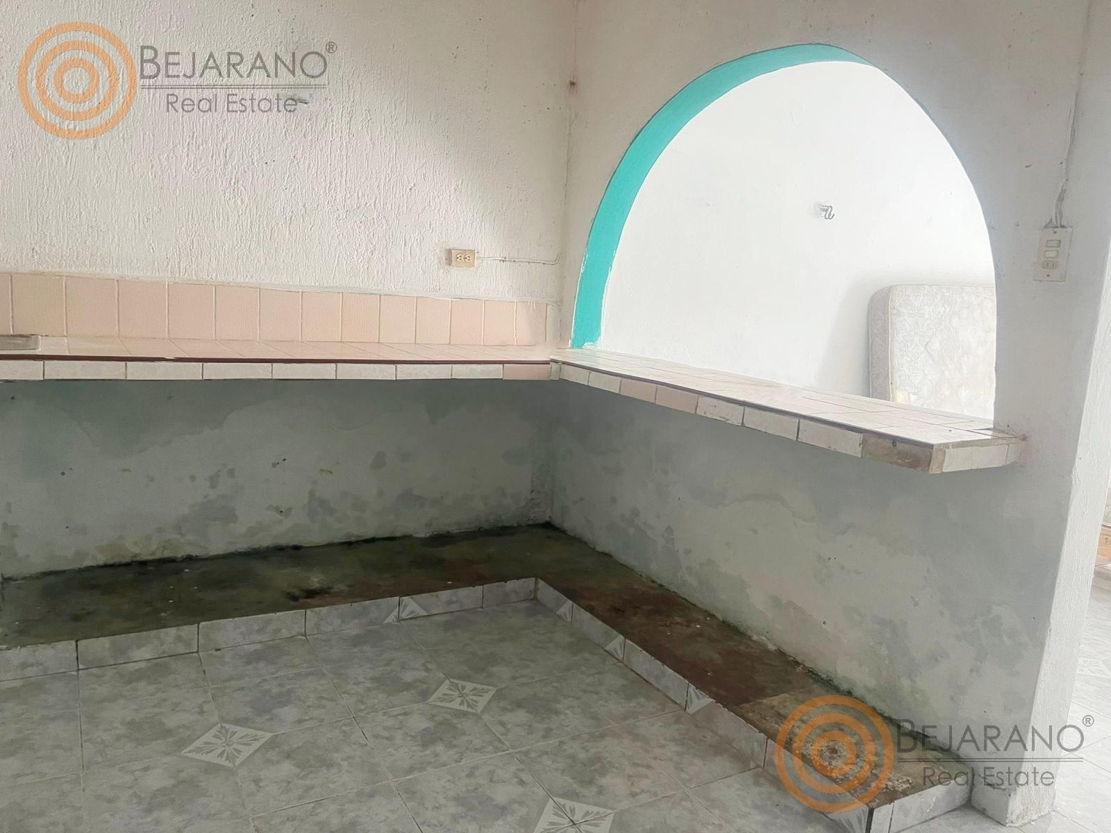 bre-cv-4deptsylc-08 Cocina de un departamento con cubierta de concreto
