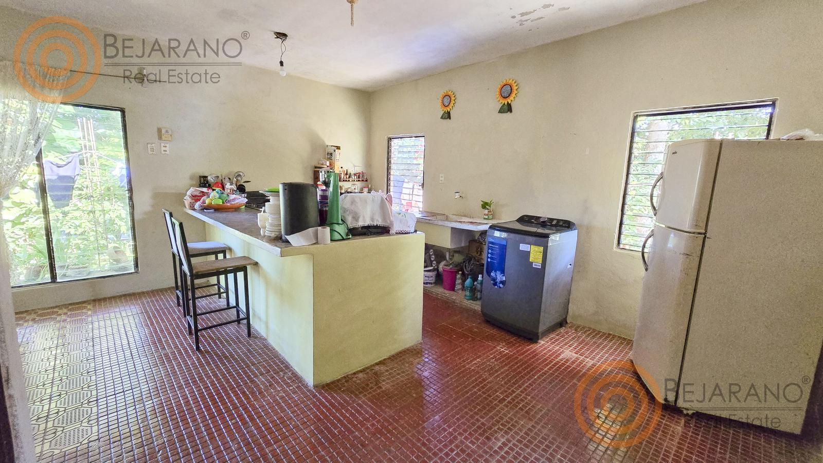 bre-cv-cuncunul-08 Cocina con barra y refrigerador