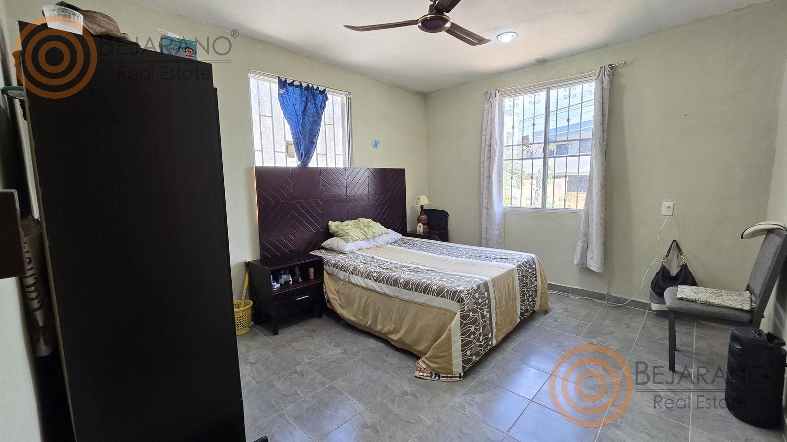 bre-cv-orqui-11 Recámara con cama, buró y ventilador de techo