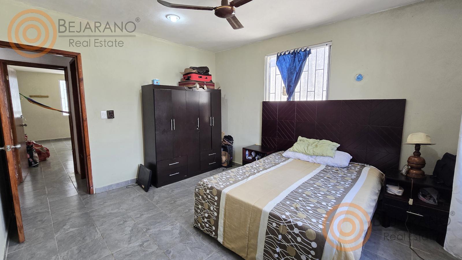 bre-cv-orqui-12 Recámara con cama, ropero y puerta a otra habitación