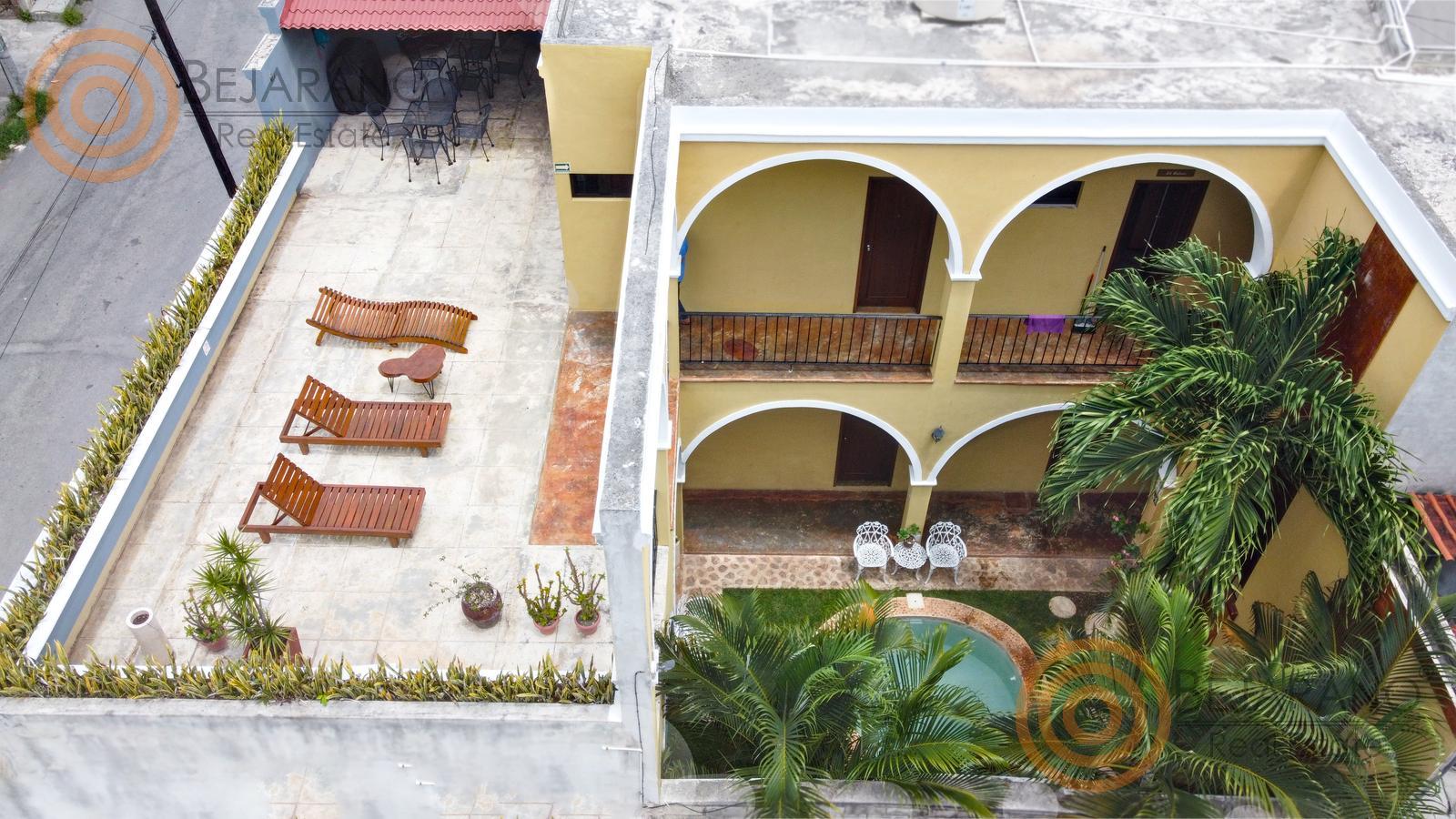 bre-hv-56sisal-26 Vista aérea del patio, alberca y terraza del hotel en venta