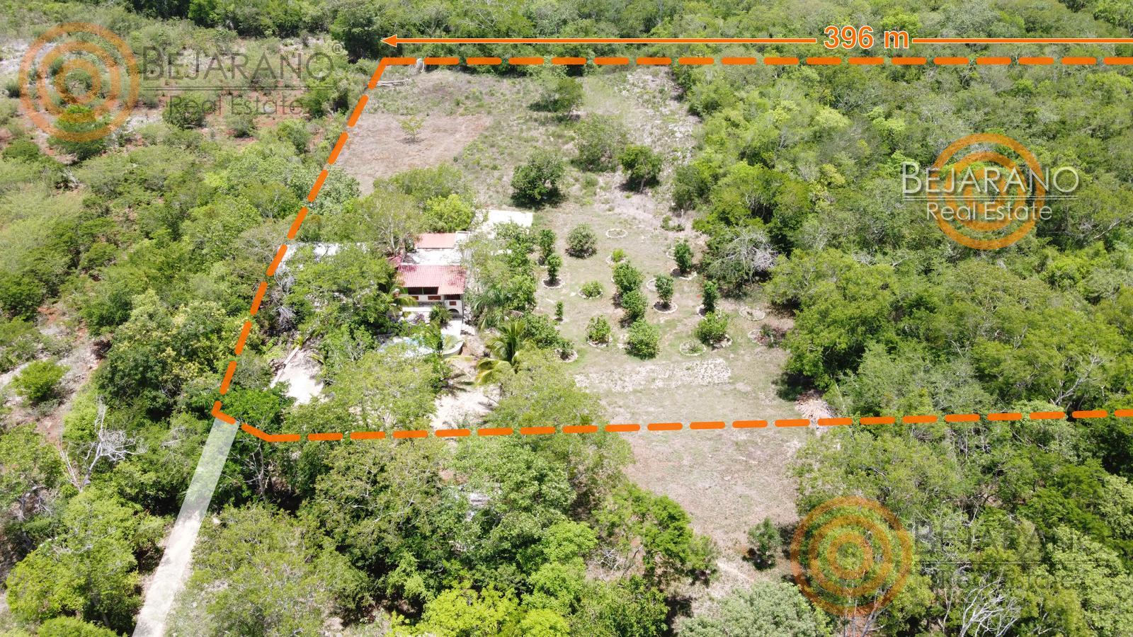 bre-rv-ebtun-01 Vista aérea del rancho de 6.9 ha en Ebtún, Valladolid, con el límite del terreno marcado