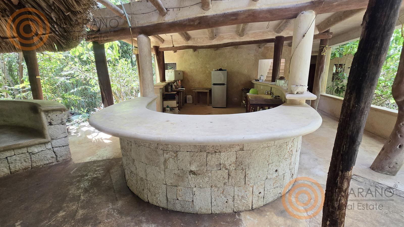 bre-rv-tixcalcupul-380-21 Barra circular de piedra y cocina de la palapa