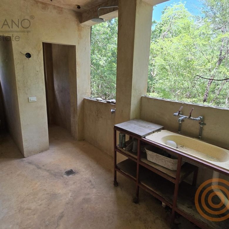 Baños y lavabo exterior del área social