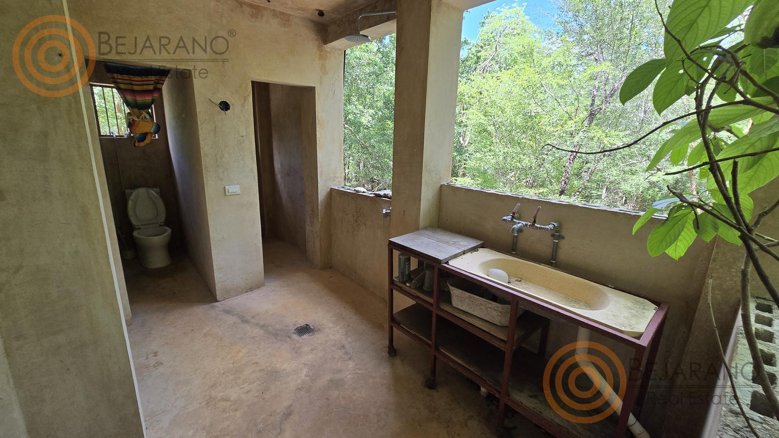 bre-rv-tixcalcupul-380-24 Baños y lavabo exterior del área social