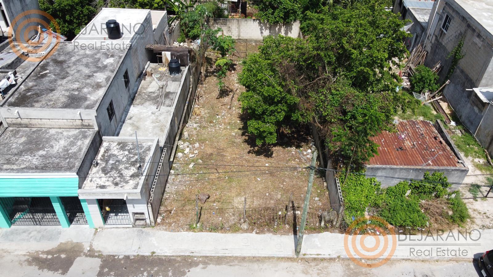 bre-tesj863-02 Vista aérea del terreno bardeado entre construcciones vecinas